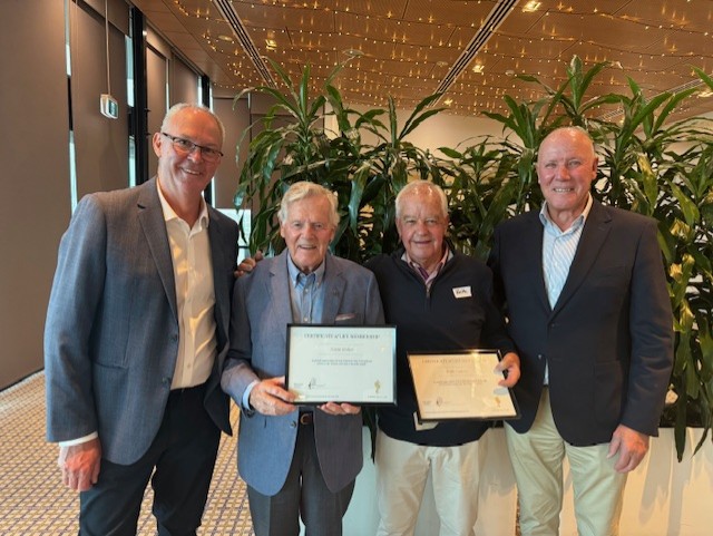 Norm receiving life membership